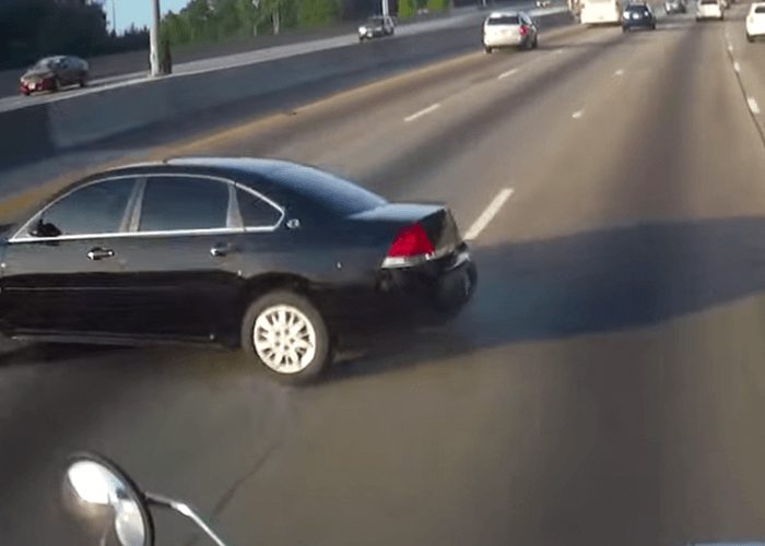 VIDEO: Close Call When Car Spins Out In Front Of Truck