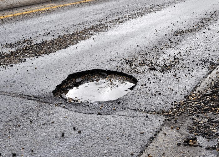 Road Damage and Vehicle Operating Costs