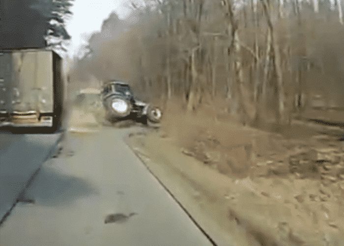 VIDEO: Truck Clips Tractor, Sends It Rolling Into Ditch