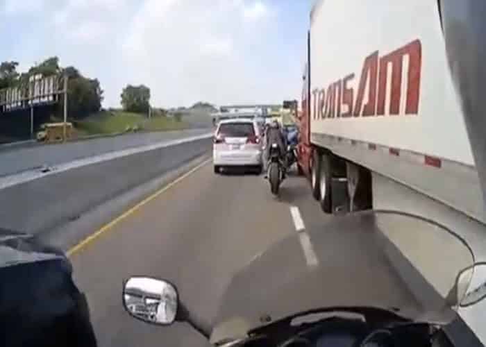 VIDEO:  Stupid Motorcyclist’s Brush With A TransAm Truck