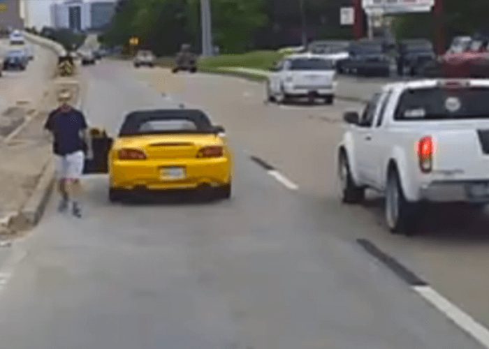 VIDEO: Road Raging Man Backs Down When Driver Gets Out Of Truck