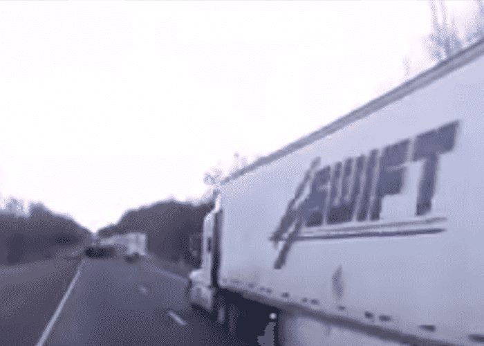 VIDEO: Trucks Struggle To Stop For Accident