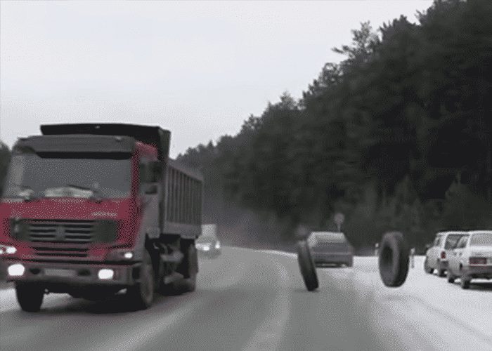 VIDEO: Driver Has To Dodge Two Tires That Fall Off Truck