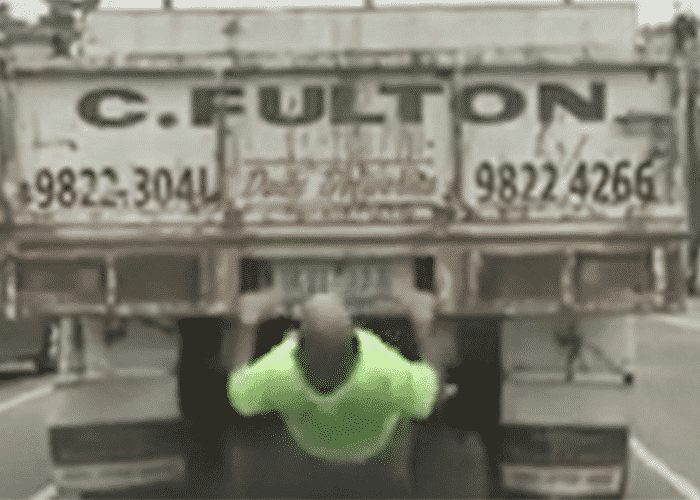 VIDEO: Driver Does Pull Ups On Truck During Traffic Jam