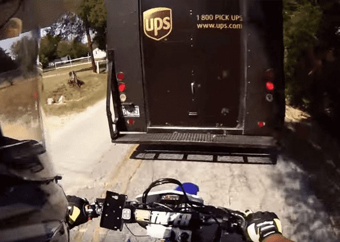 VIDEO: Inattentive Dirt Bike Rider Slams Into UPS Truck