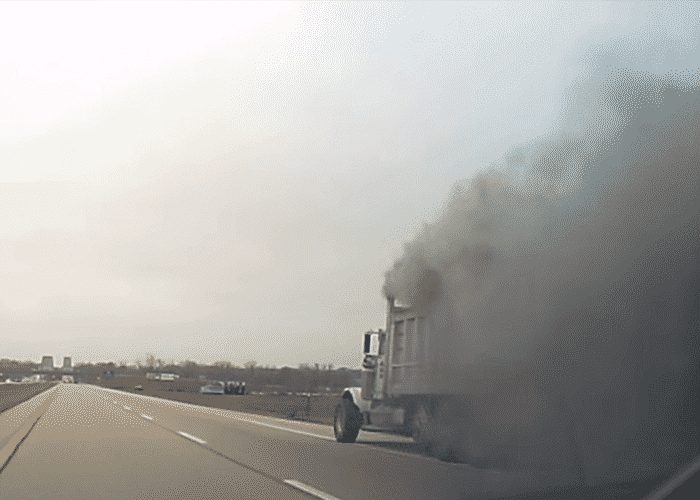 VIDEO: Smoking Dump Truck Creates Near Grey Out Conditions On Highway