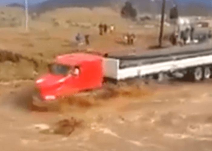 VIDEO: Trucker Has No Fear Of Flood Waters