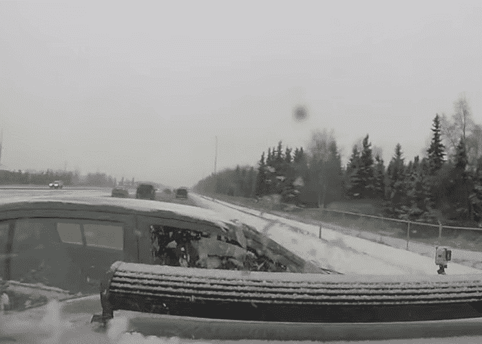 VIDEO: Lane Changing Driver Crashes On Icy Alaskan Highway