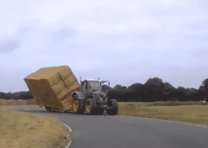 VIDEO: Hay Bale Trailer Tips Over