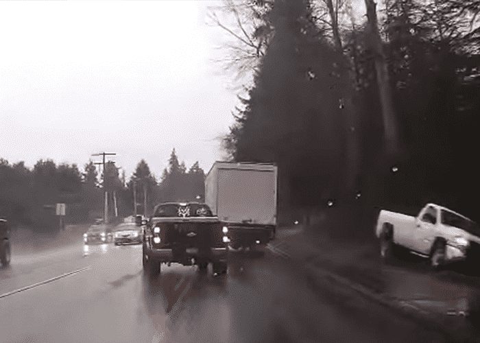 VIDEO: Passed Out Pickup Driver Almost Hits Truck Head On