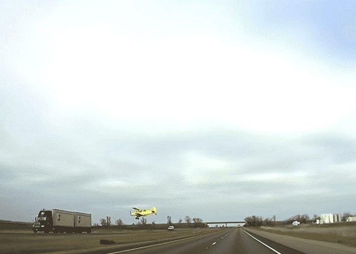 VIDEO: Plane Buzzing Highway Almost Hits Truck