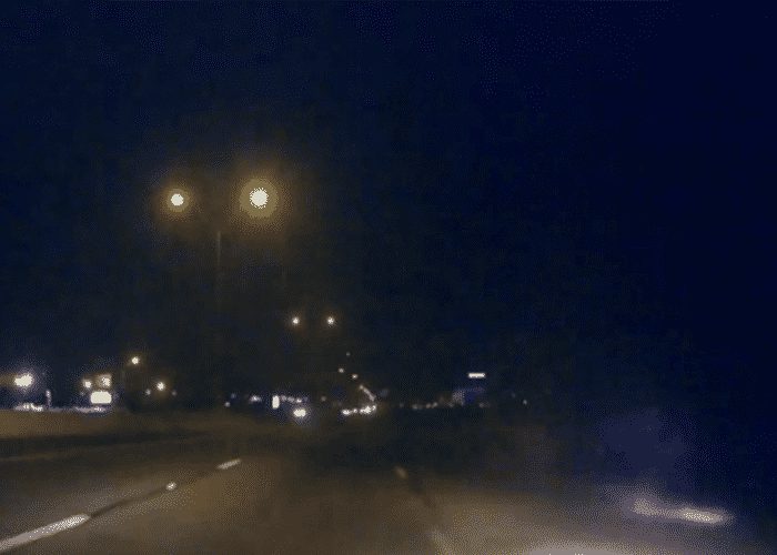 VIDEO: Burning Car Hidden By Black Smoke Causes Crash