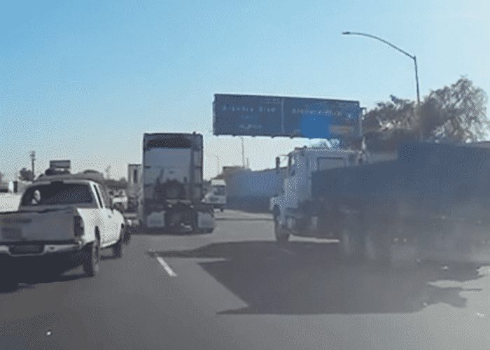 VIDEO: Blowout Sends Pickup Crashing Into Truck