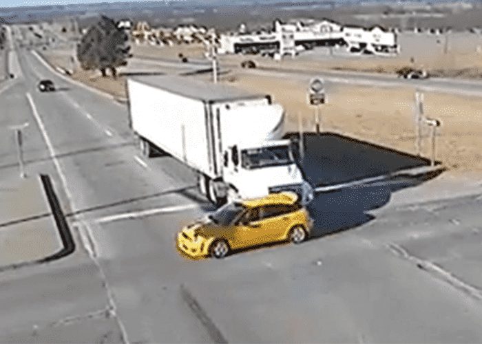 VIDEO: Red Light Runner Pays The Price