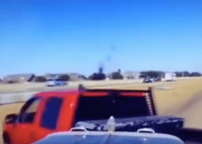 VIDEO: Red Pickup Menaces Trucker And Pays The Price