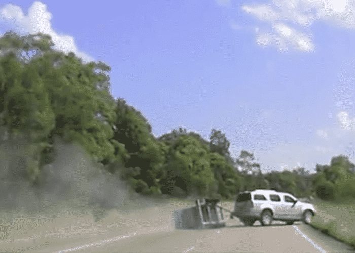 VIDEO: Snaking Trailer Causes SUV To Roll