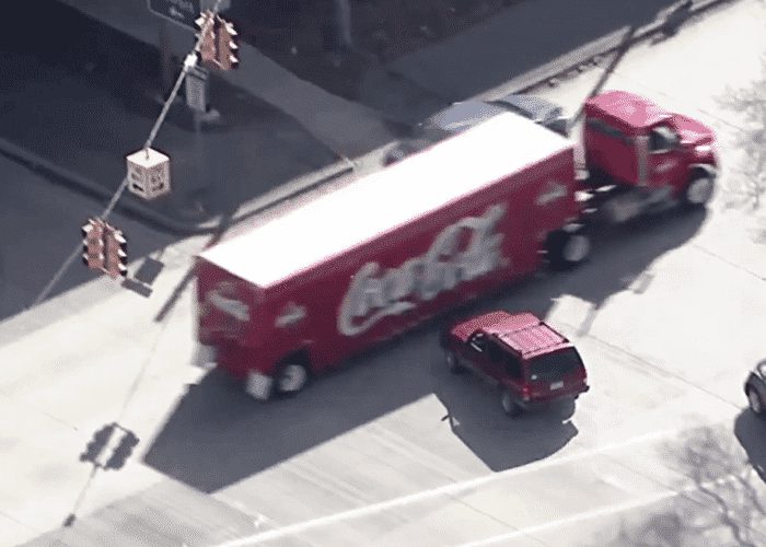 VIDEO: Police Chase Ends With Crash Into Coca Cola Truck