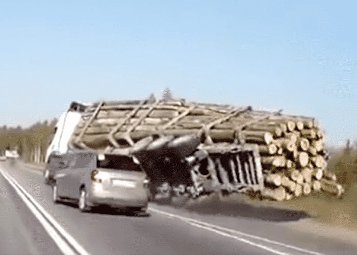 VIDEO: Four Wheeler Runs Two Trucks Off The Road