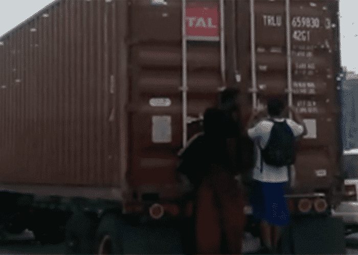 VIDEO: Idiots Hitch A Ride On Back Of A Truck