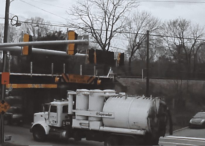 VIDEO: Industrial Vacuum Truck Vs. 11 Foot 8 Bridge