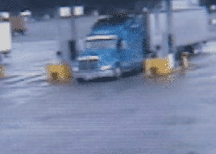 Man Escapes In Truck's Air Foil