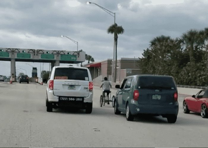 VIDEO: Motorists Form Barrier For Child Biking On Skyway Bridge