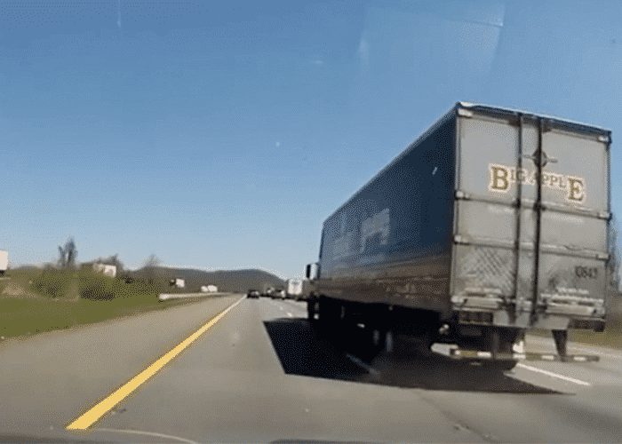 VIDEO: Truck Runs Car Off Road To Avoid Hitting Slowed Traffic