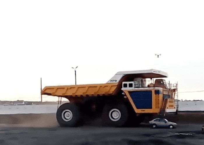 VIDEO: Truck Turns Car Into Total Pancake