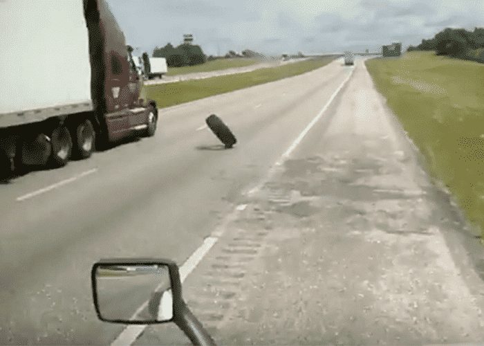 VIDEO: Blown Steer Tire Makes Amazing Escape Under Another Truck