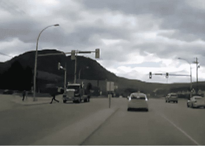 Pedestrian Has Extreme Close Call WIth Truck