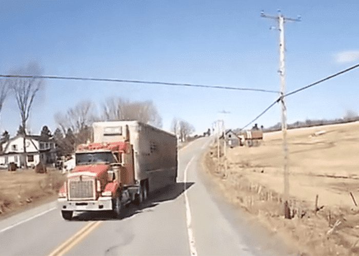 VIDEO: Terrifying Two Truck Head On Collision Narrowly Averted