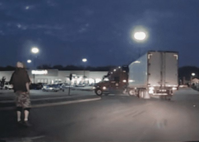 VIDEO: Retired Trucker Gets Out To Help Stuck Driver