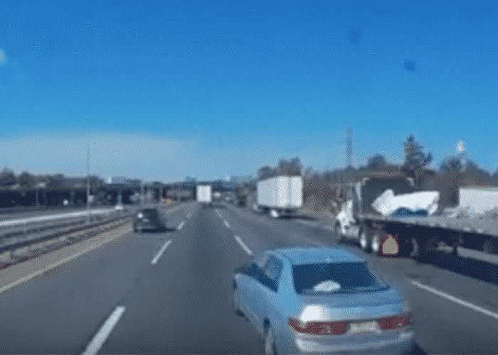 VIDEO: Semi Collides With Indecisive Lane Changer