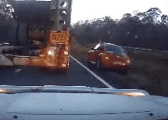 VIDEO: VW Beetle Pays The Price For Trying To Squeeze Past Oversized Load