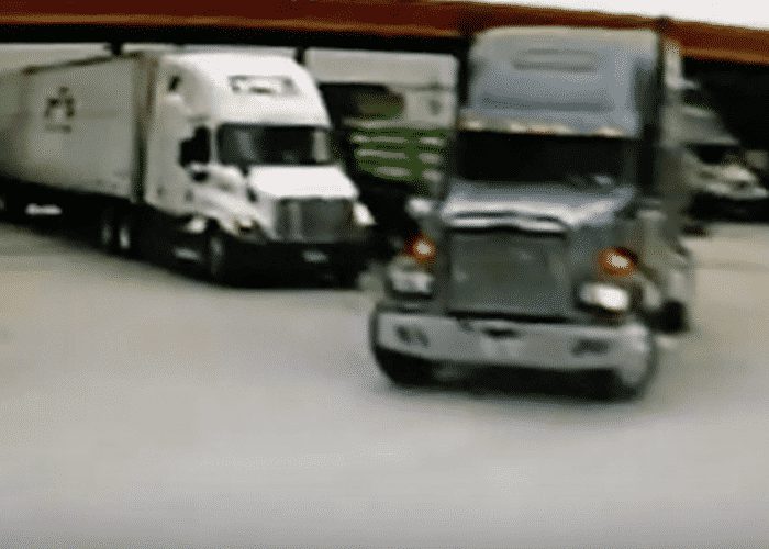 VIDEO: Flatbedder’s Tight Turn Causes Truck Stop Crash