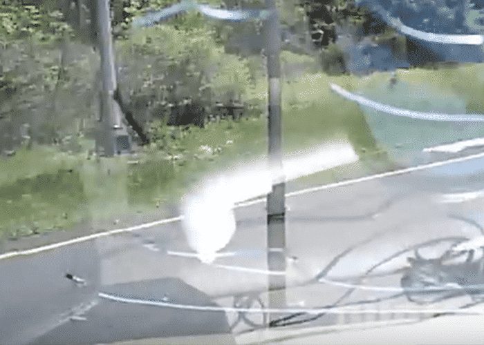 VIDEO: Pilot Car Gets Clipped And Crashes Into The Woods