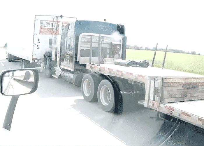 VIDEO: Semi Barely Brakes Before Rear Ending Trailer