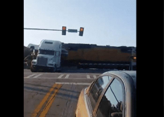 VIDEO: Car Carrier Smashed By Train