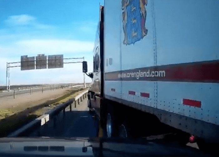 VIDEO: Merging Semi Crosses Into Left Lane, Crushes Toyota