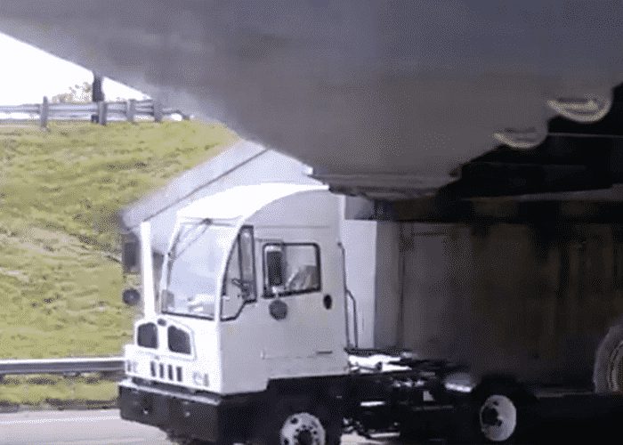 VIDEO: Bridge Decapitates Yard Truck