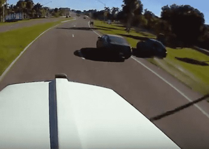 VIDEO: Car Passing On Shoulder Almost Hits Pedestrians