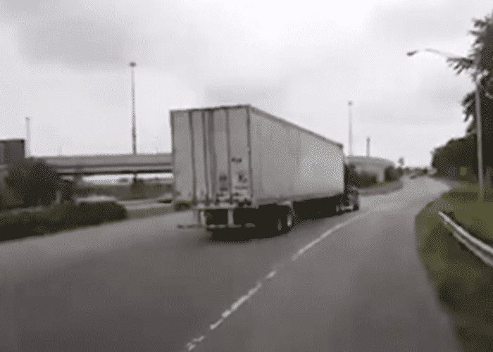 VIDEO: Men Have Hilarious Reaction To A Police Chase Involving A Semi