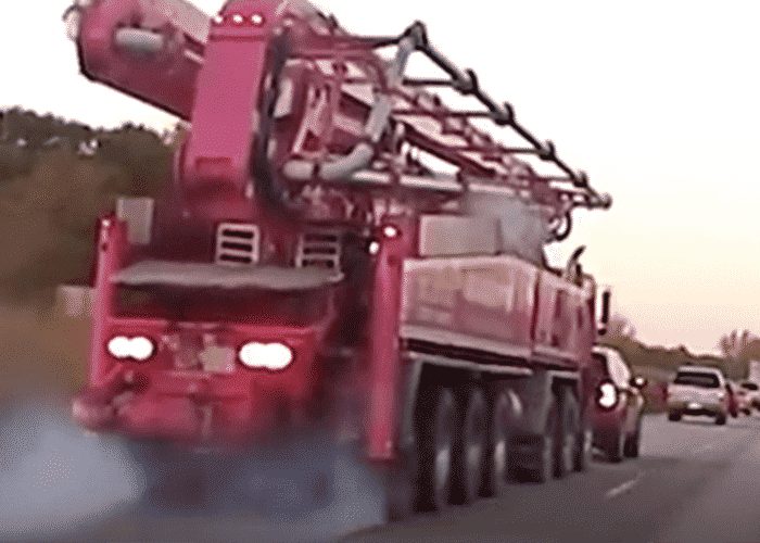 VIDEO: Motorist With A Death Wish Brake Checks Concrete Pump Truck