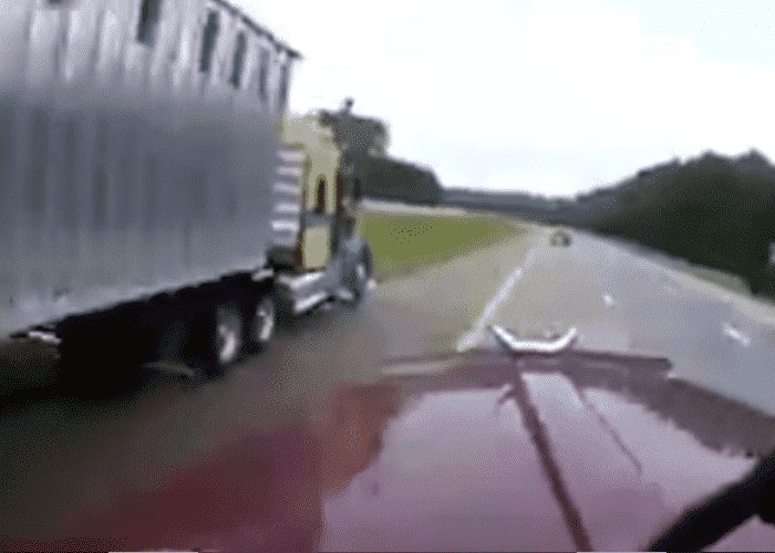 VIDEO: One Dumb Driver Almost Takes Out Two Semis