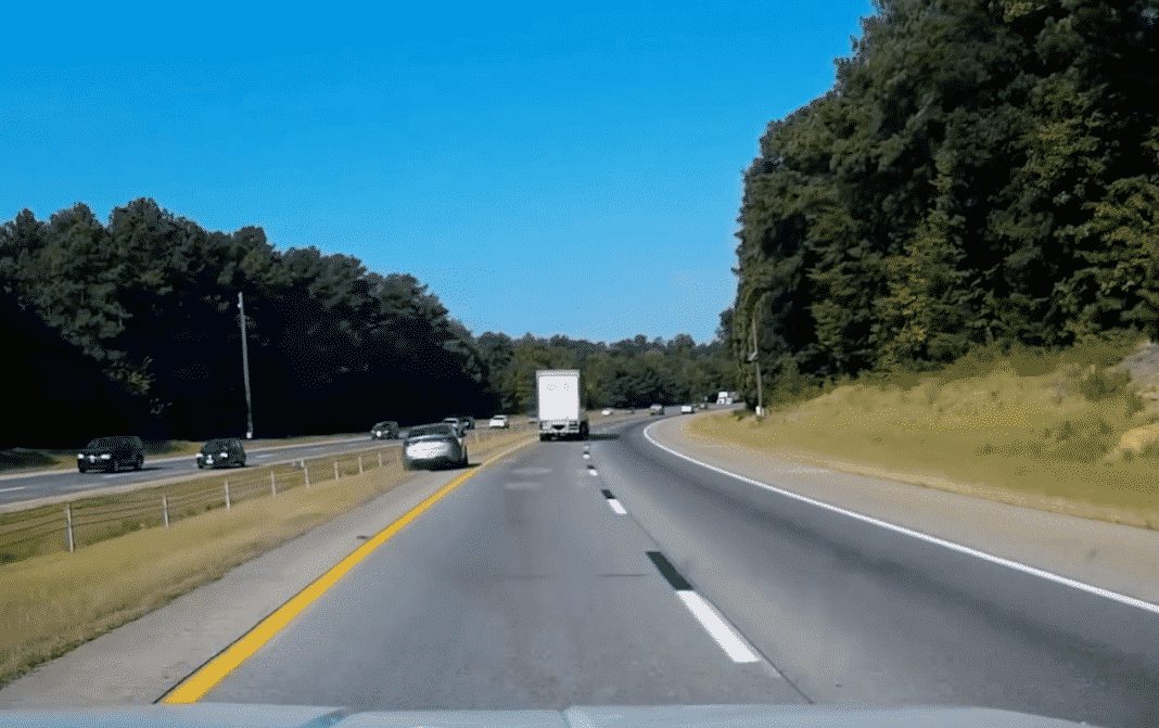 VIDEO: DWI Motorist Has Numerous Close Calls With Semi