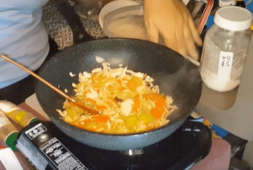 VIDEO: Driver Shows You How To Cook Singapore Noodles In Cab
