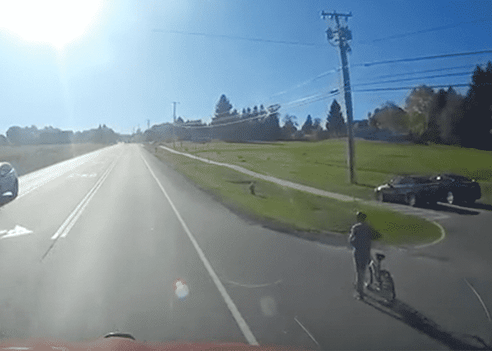 VIDEO: Slow Poke With A Bike Has A Death Wish