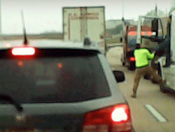 VIDEO: Man Tries To Yank Trucker Out Of Cab