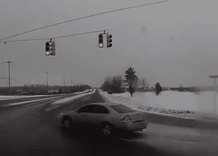 VIDEO: Trucker Has Close Call With Red Light Runner