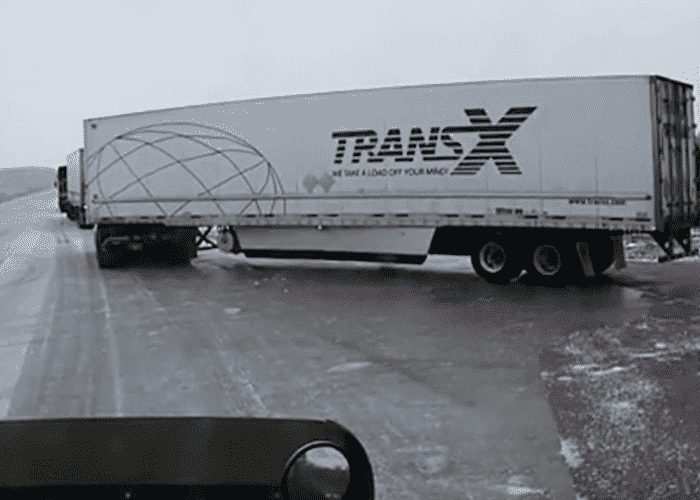 VIDEO: Wind And Ice Send Trailer Sliding Right